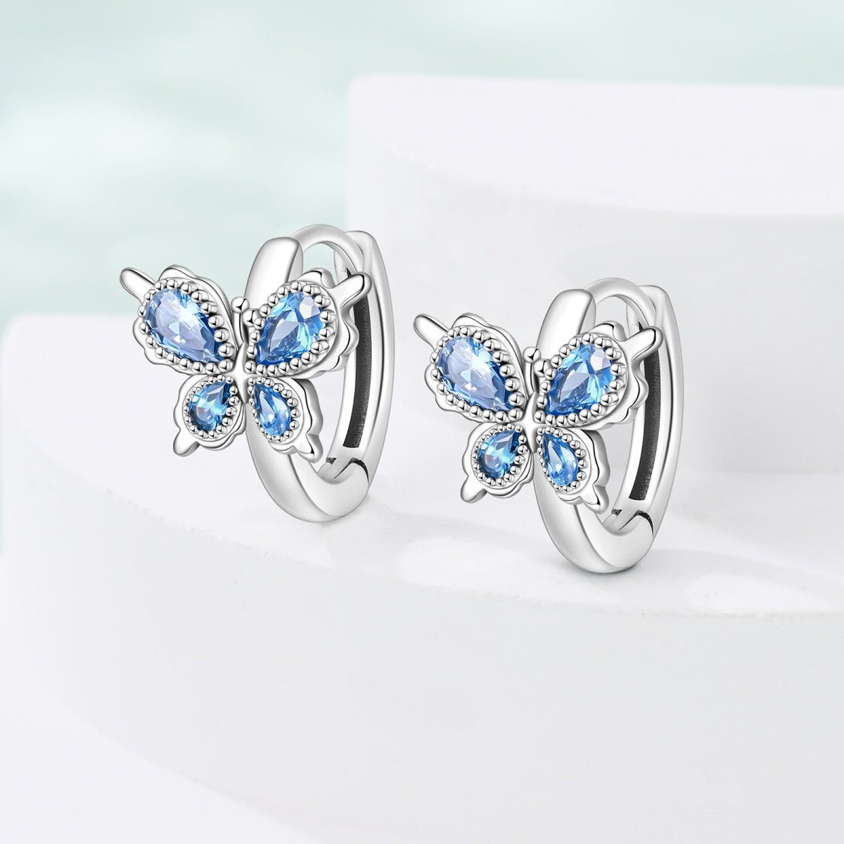 Liora Atelier Blue Butterfly with Crystal Wings Hoop Earrings