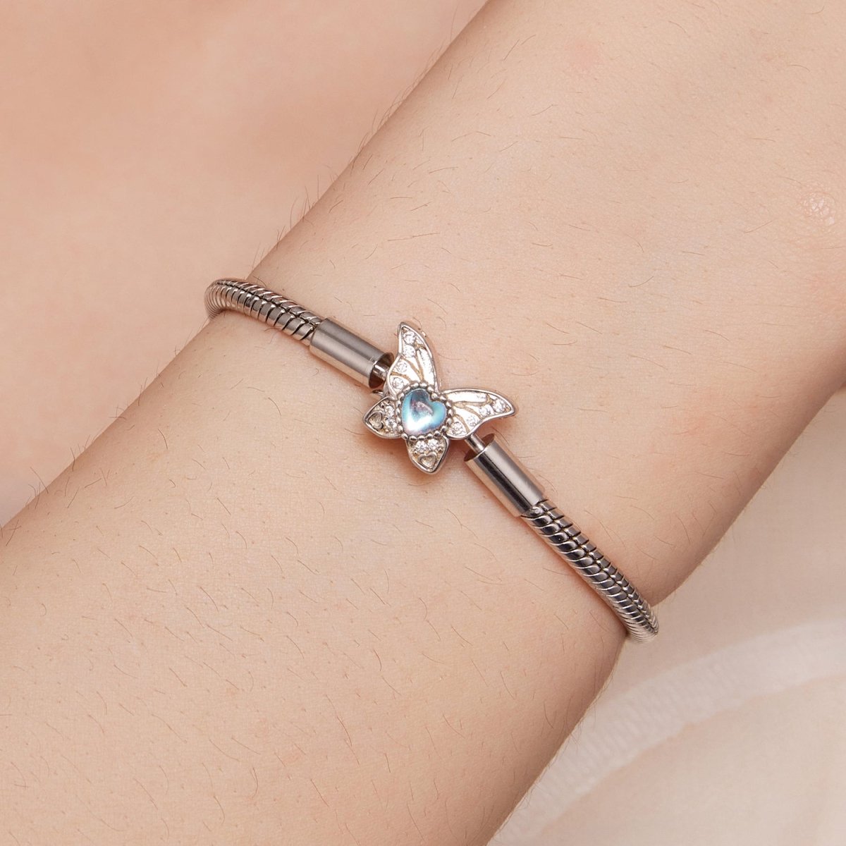 Liora Atelier Blue Heart Butterfly Clasp Charm Bracelet