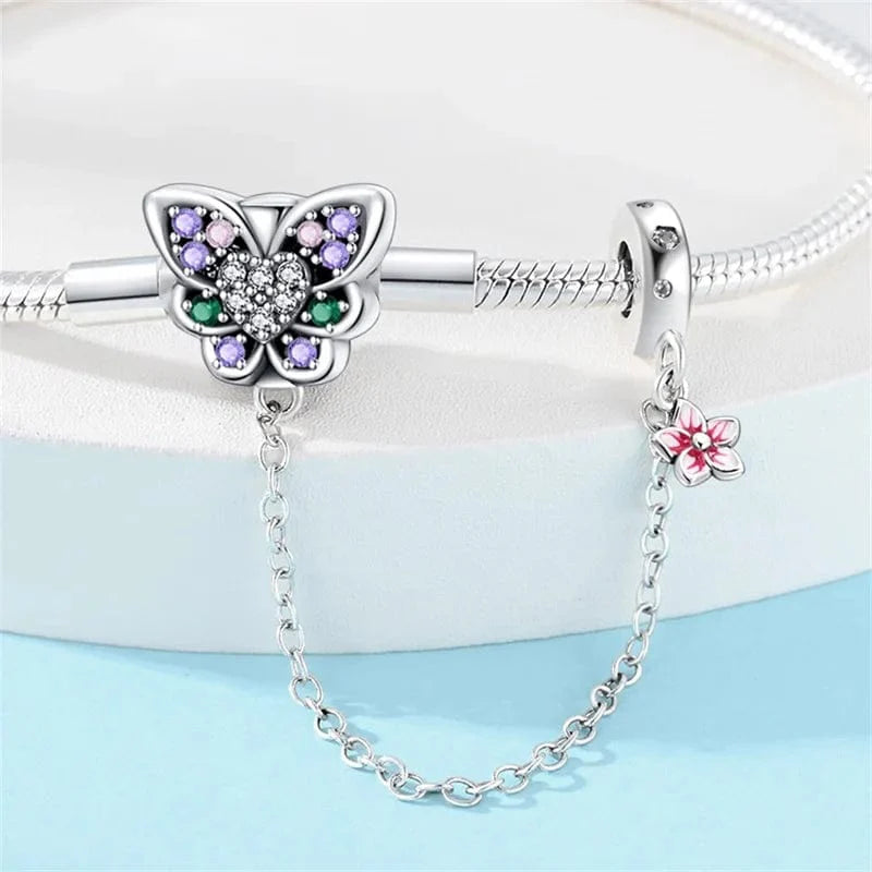 Liora Atelier Butterfly Charm Bracelet with Crystal Accents and Flower Dangle