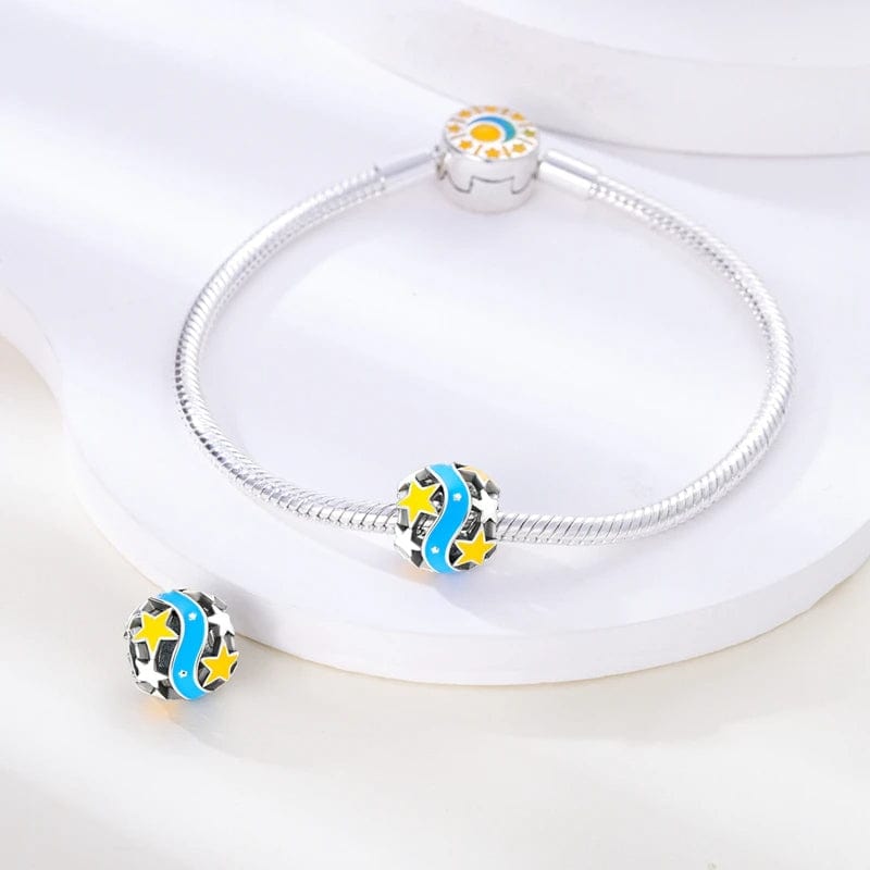 Liora Atelier Glow in the Dark Luminous Yellow Star Blue Ribbon Charm