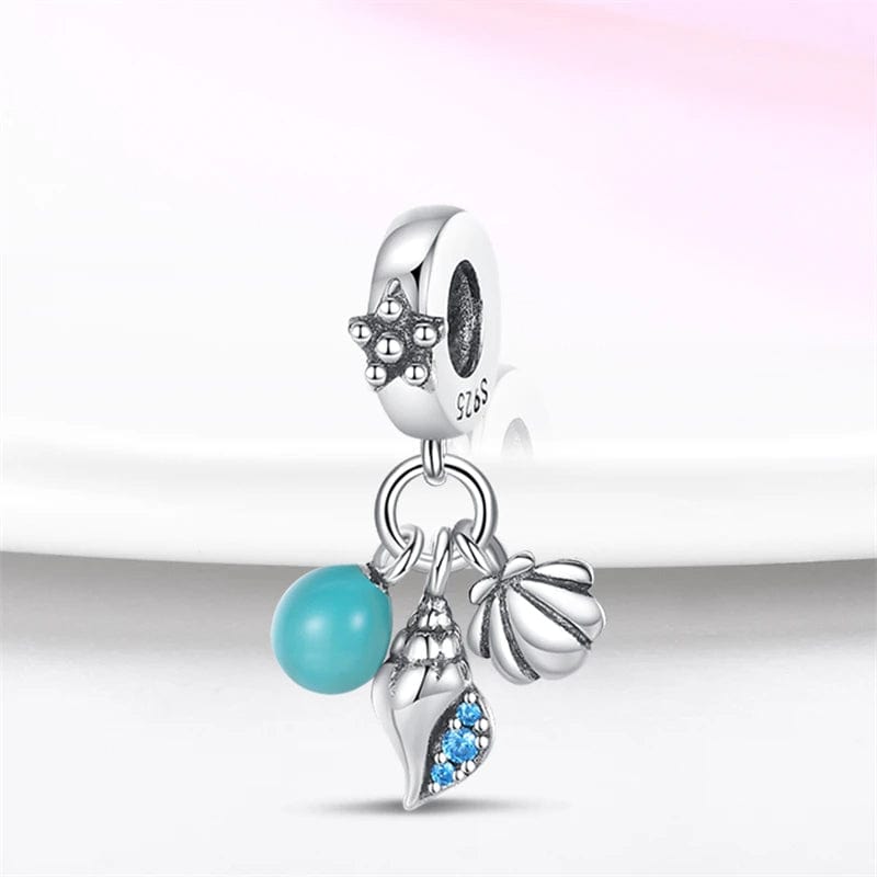 Liora Atelier Glow in the Dark Orb Conch Shell and Clam Dangle Charm