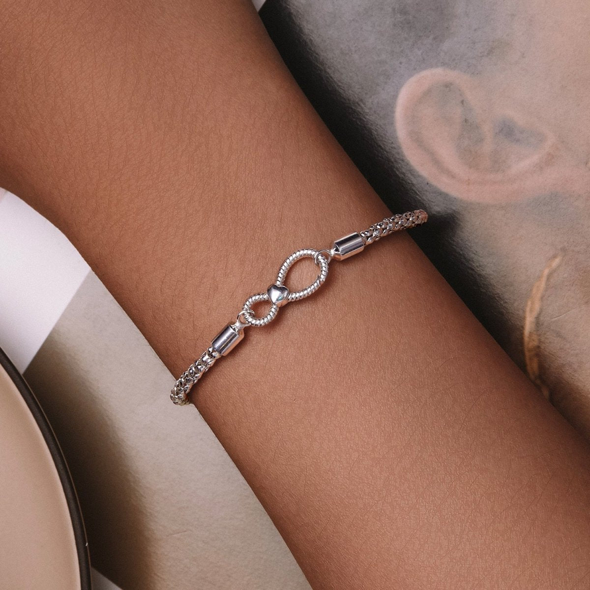 Liora Atelier Infinity Clasp Woven Charm Bracelet
