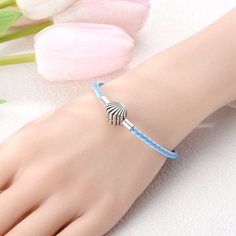 Liora Atelier Ocean Blue Braided Leather Bracelet with Seashell Clasp
