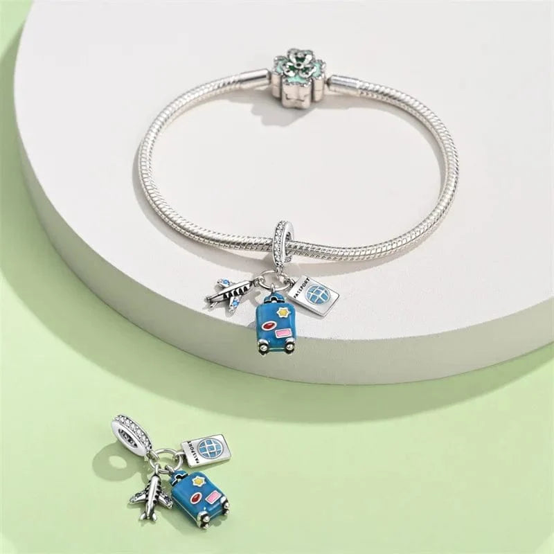 Liora Atelier Plane, Passport and Blue Suitcase Triple Dangle Charm