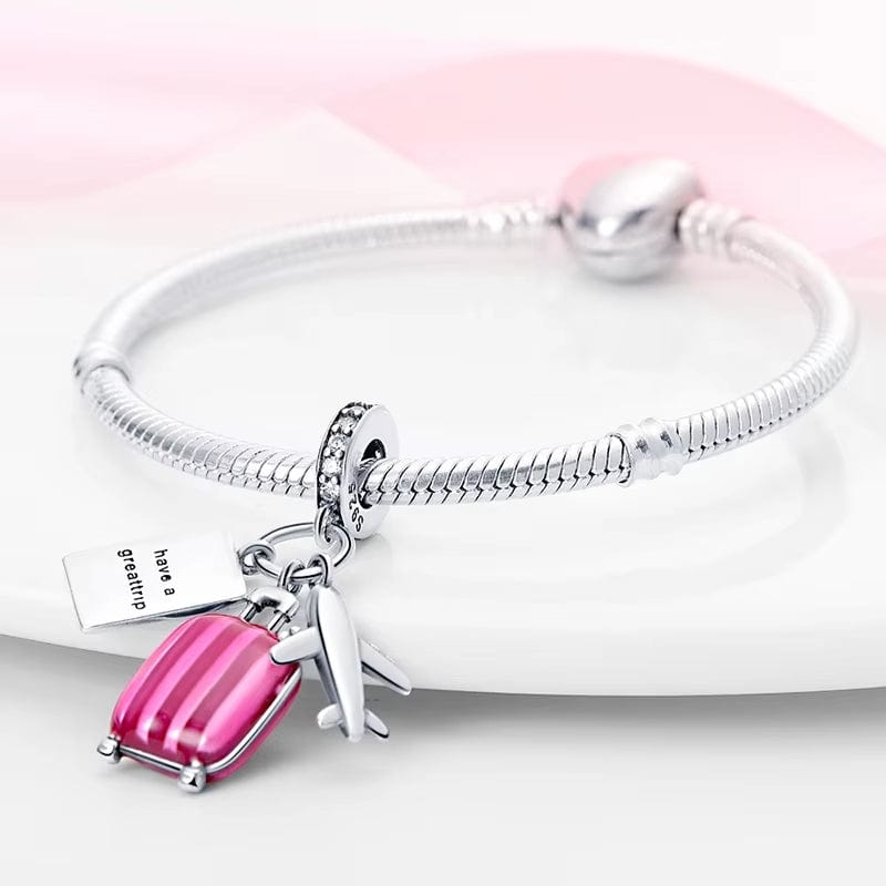 Liora Atelier Plane, Passport and Pink Suitcase Triple Dangle Charm