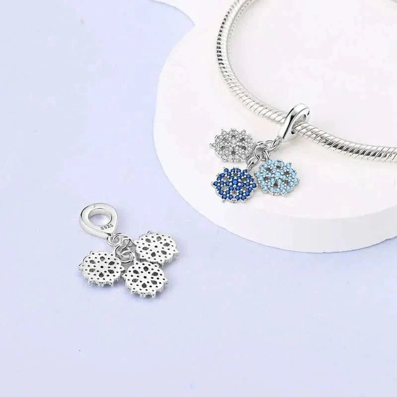 Liora Atelier Triple Snowflake Charm with Sparkling Blue and White Crystals
