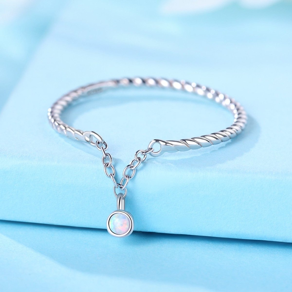 Liora Atelier Twisted Rope Sterling Silver Ring with Dainty Opal