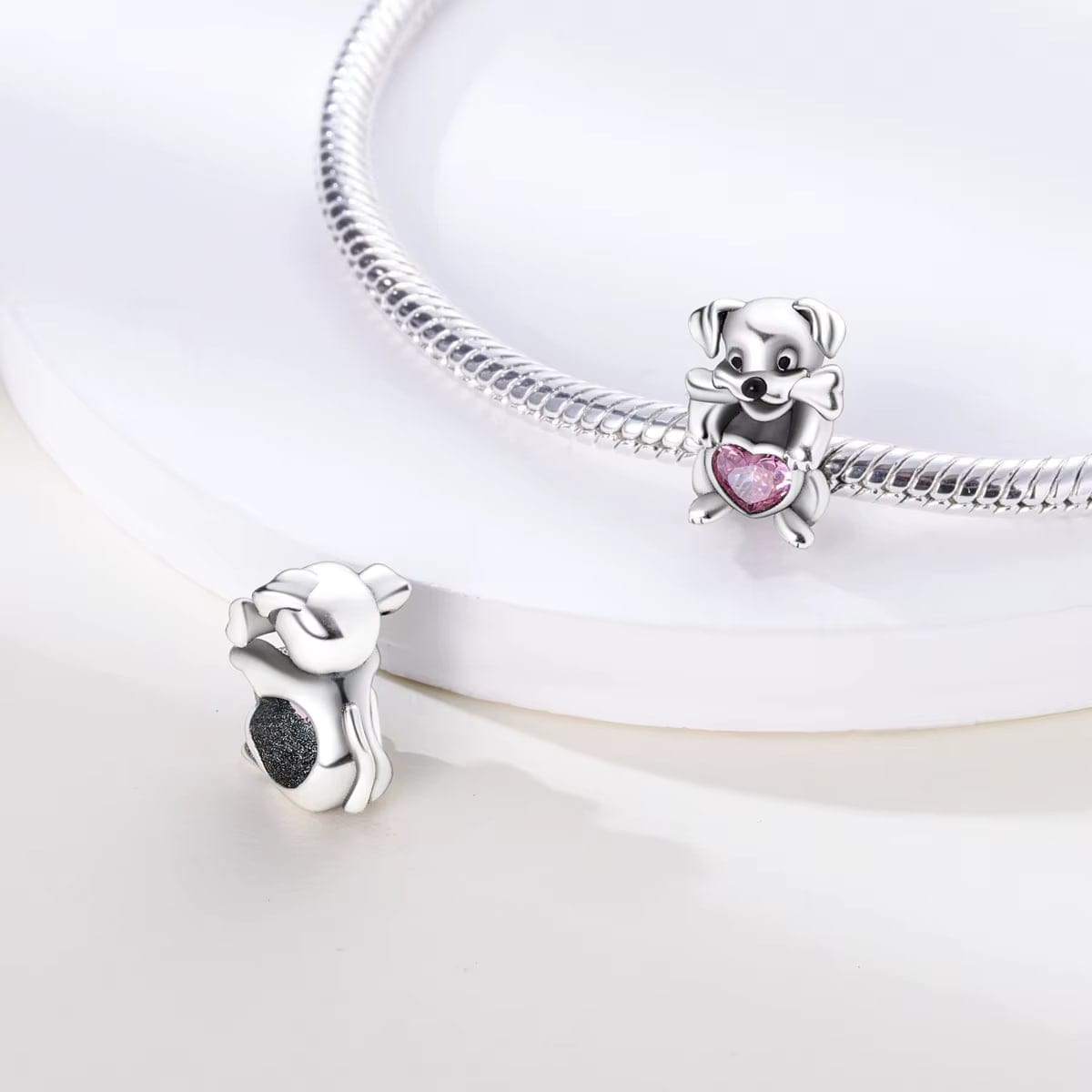 Liora Atelier Dog Holding Pink Heart Charm