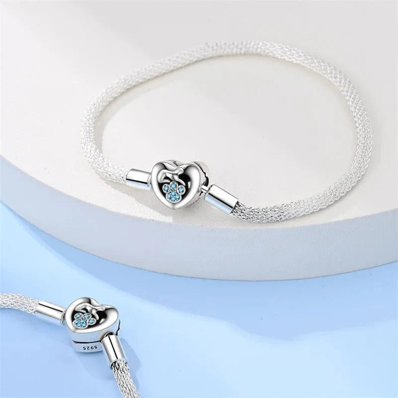 Liora Atelier Elegant Heart Clasp Bracelet with Blue Paw Gemstones