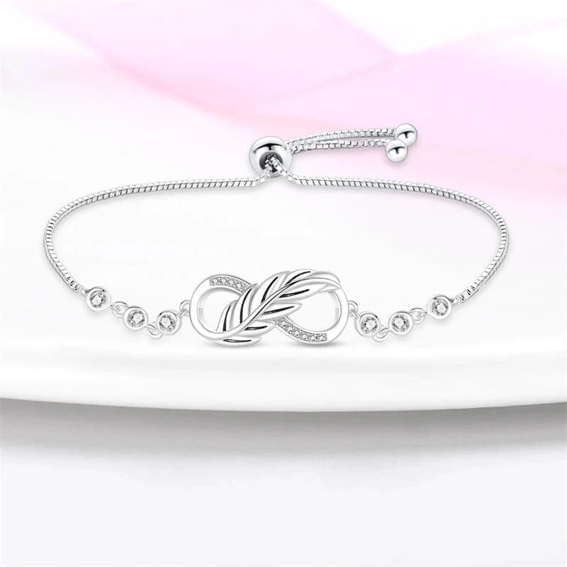Liora Atelier Elegant Infinity Knot Bracelet with Crystal Accents