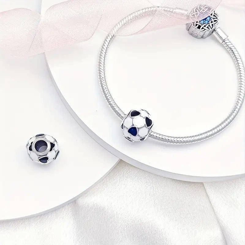 Liora Atelier FootBall Bead With Blue Heart Accents