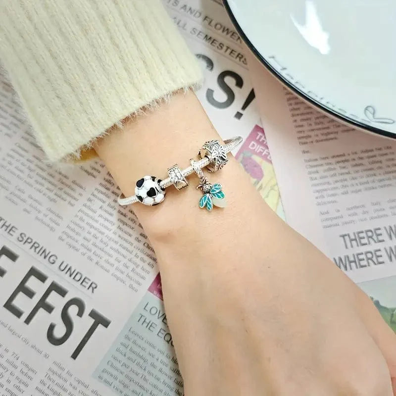 Liora Atelier FootBall Bead With Blue Heart Accents