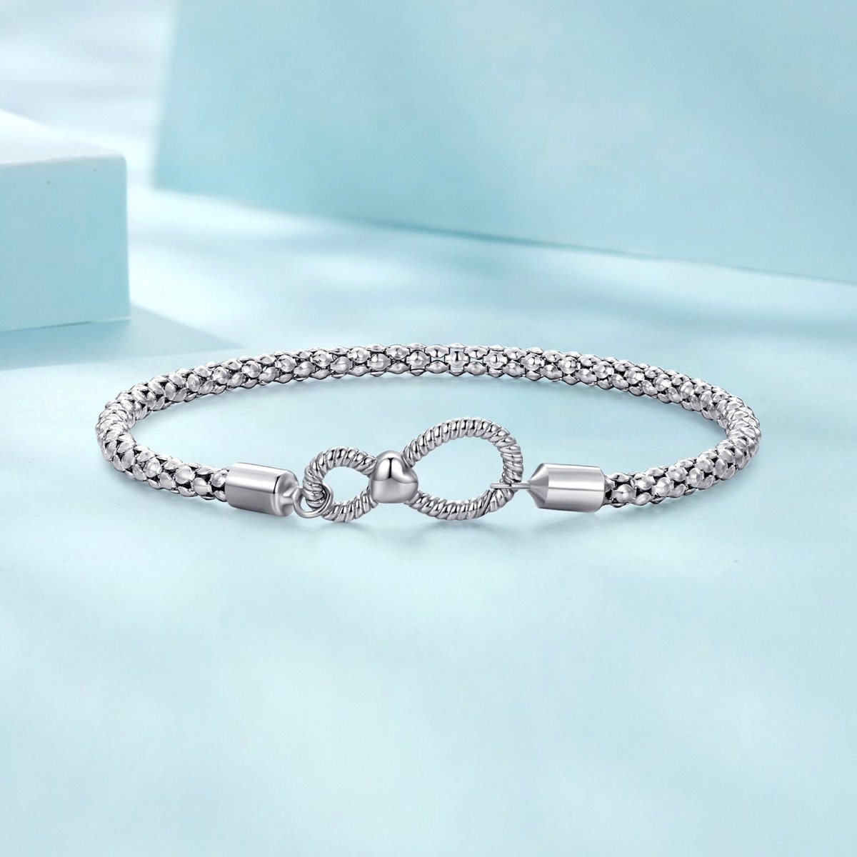 Liora Atelier Infinity Clasp Woven Charm Bracelet