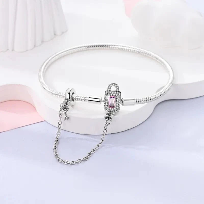 Liora Atelier Lock and Key Bracelet with Pink Crystal and Safety Chain