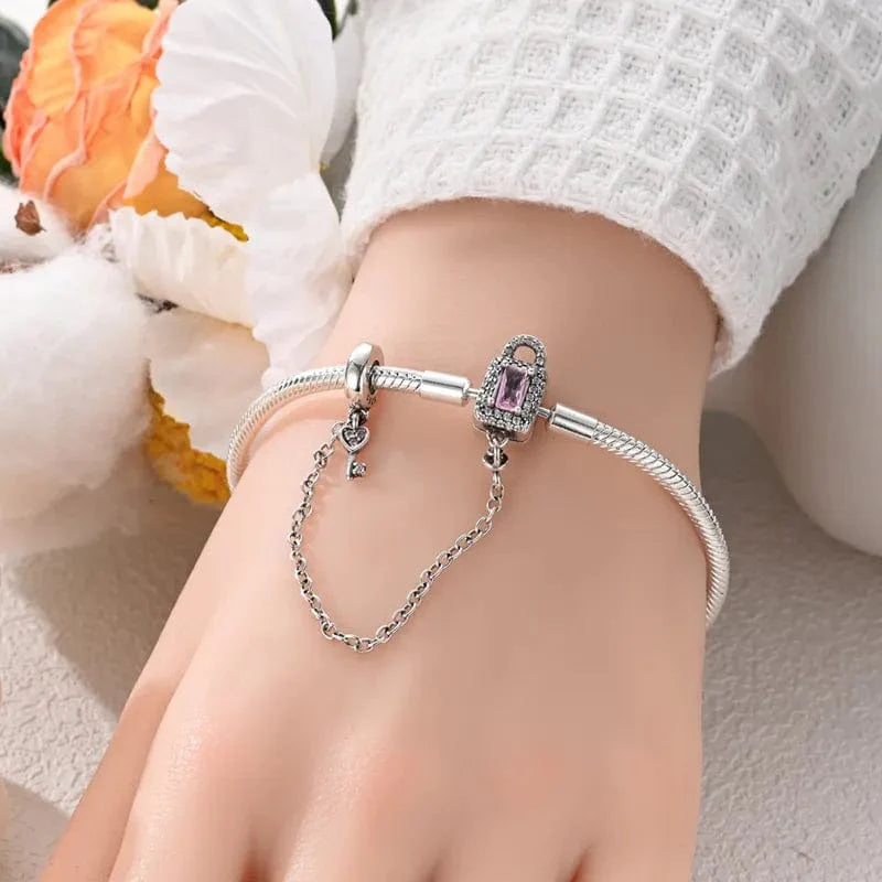 Liora Atelier Lock and Key Bracelet with Pink Crystal and Safety Chain