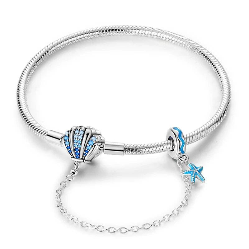 Liora Atelier Ocean - Themed Bracelet with Blue Crystal Seashell and Starfish Charms