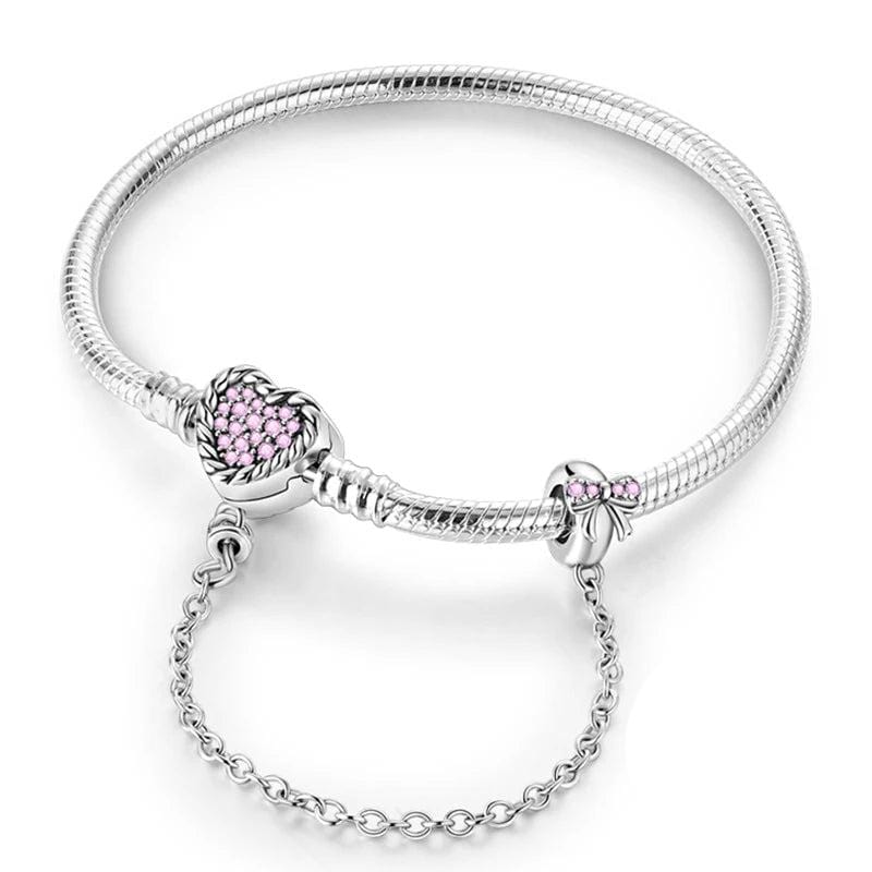 Liora Atelier Pink Crystal Heart Charm Bracelet with Bow and Safety Chain