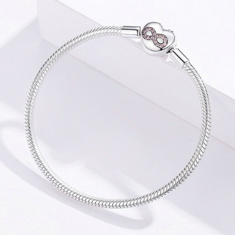 Liora Atelier Pink Infinity Heart Clasp Charm Bracelet