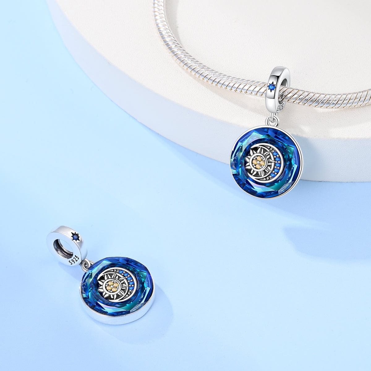 Liora Atelier Sapphire Blue Crystal Charm with Sun & Moon Accent