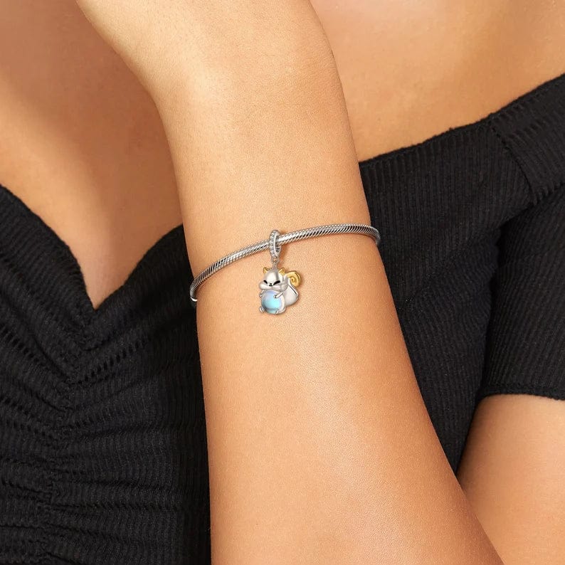Liora Atelier Squirrel Hugging a Light Sphere Dangle Charm