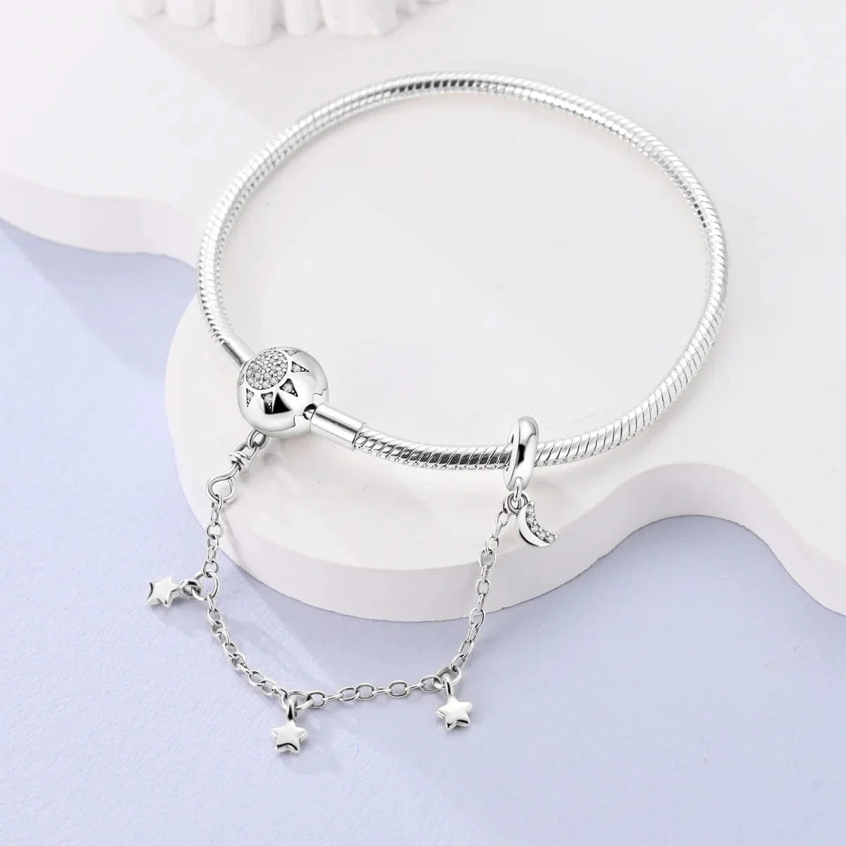 Liora Atelier Sunburst Clasp Snake Chain Bracelet with Star Charm Safety Chain