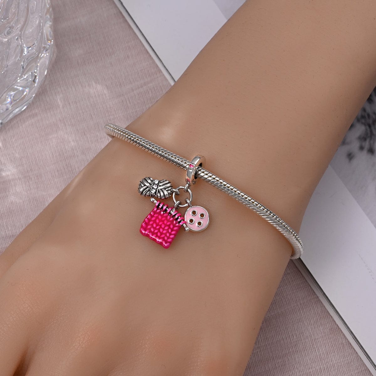 Liora Atelier Yarn, Knitted Fabric, & Button Charm